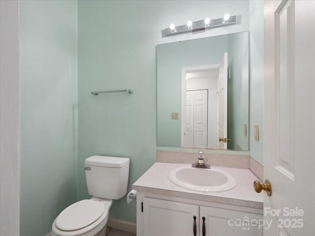 3327 Archdale Dr, Charlotte, NC 28210 - half bathroom featuring toilet and vanity