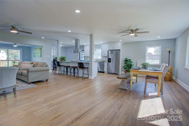 8607 Larchmont Cir, Charlotte, NC 28214 - dining area featuring ceiling fan, light wood-type flooring, recessed lighting, and baseboards
