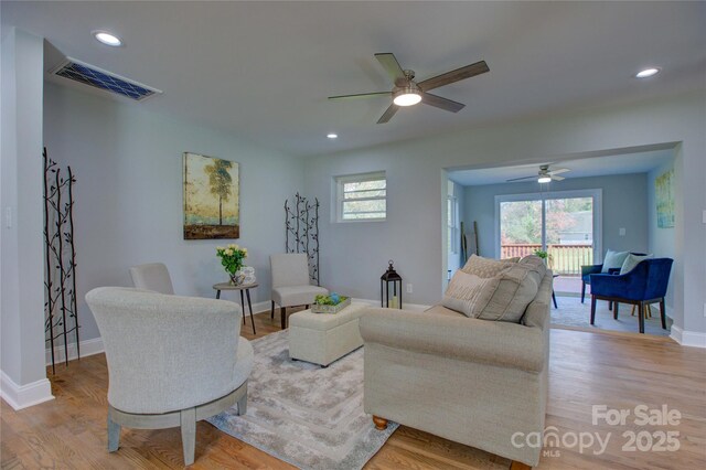 8607 Larchmont Cir, Charlotte, NC 28214 - living area with ceiling fan, healthy amount of natural light, baseboards, and recessed lighting