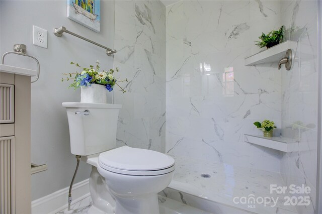 8607 Larchmont Cir, Charlotte, NC 28214 - bathroom with toilet, a marble finish shower, marble finish flooring, and baseboards