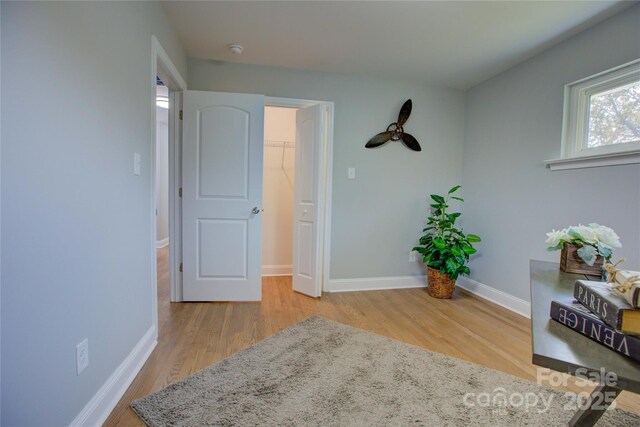 8607 Larchmont Cir, Charlotte, NC 28214 - bedroom featuring wood finished floors and baseboards