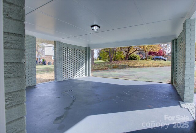 8607 Larchmont Cir, Charlotte, NC 28214 - view of patio with an attached carport