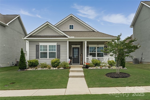 148 Kerri Dawn Ln, Locust, NC 28097 - view of front of property with a porch, a front lawn, central AC, and roof with shingles
