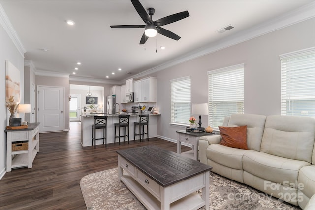148 Kerri Dawn Ln, Locust, NC 28097 - living room with ceiling fan, healthy amount of natural light, ornamental molding, dark wood-type flooring, and recessed lighting