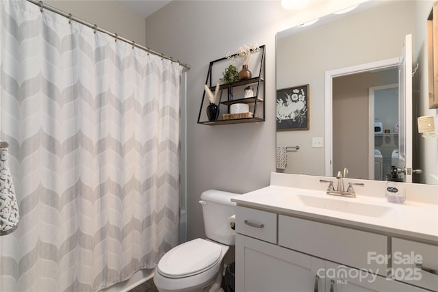 148 Kerri Dawn Ln, Locust, NC 28097 - bathroom with vanity, toilet, a shower with curtain, and washer and clothes dryer