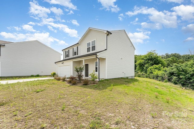 3077 Light Ridge Ct SW, Concord, NC 28027 - rear view of house featuring an attached garage and driveway