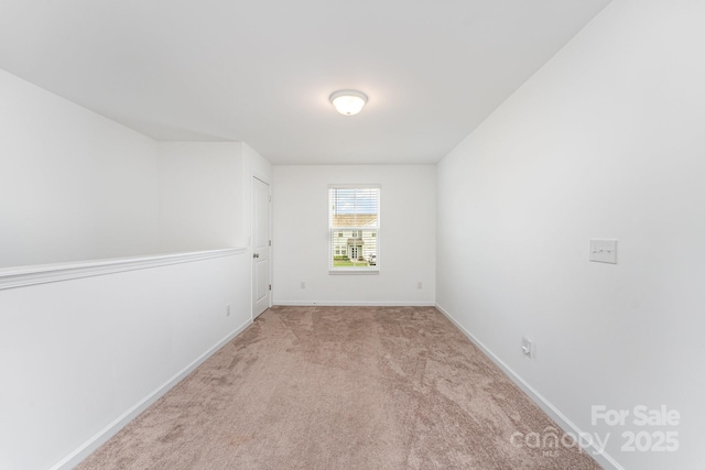 3077 Light Ridge Ct SW, Concord, NC 28027 - carpeted spare room with baseboards