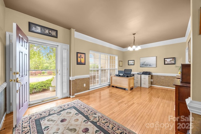 6533 Derby Ln NW, Concord, NC 28027 - office area featuring light wood-style floors, a chandelier, crown molding, baseboards, and wainscoting