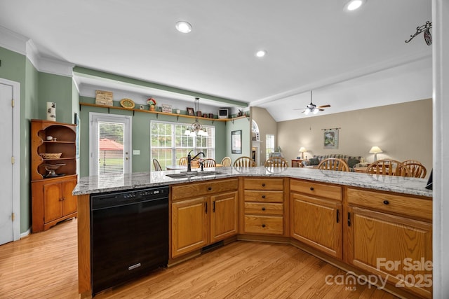 6533 Derby Ln NW, Concord, NC 28027 - kitchen featuring dishwasher, a sink, light wood-type flooring, lofted ceiling, and light stone counters