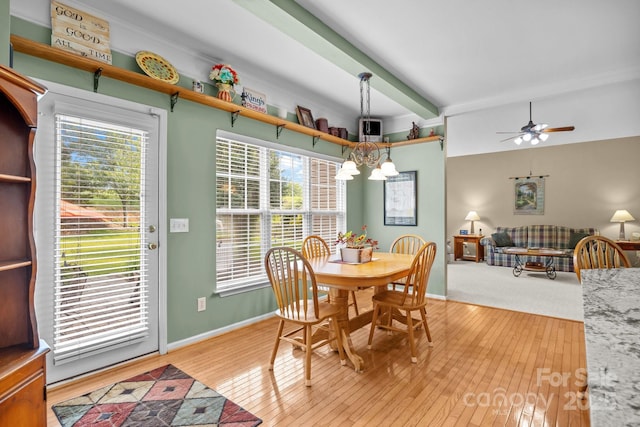 6533 Derby Ln NW, Concord, NC 28027 - dining area with a chandelier, beamed ceiling, light wood-type flooring, ceiling fan, and baseboards