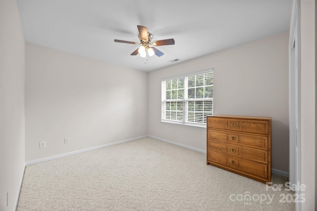 6533 Derby Ln NW, Concord, NC 28027 - carpeted spare room featuring ceiling fan and baseboards