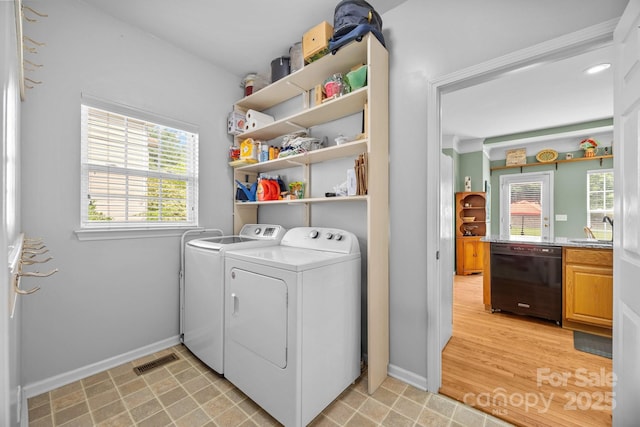 6533 Derby Ln NW, Concord, NC 28027 - laundry area with separate washer and dryer and baseboards