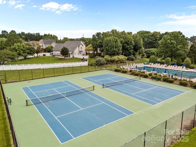 6533 Derby Ln NW, Concord, NC 28027 - view of tennis court with view of scattered trees