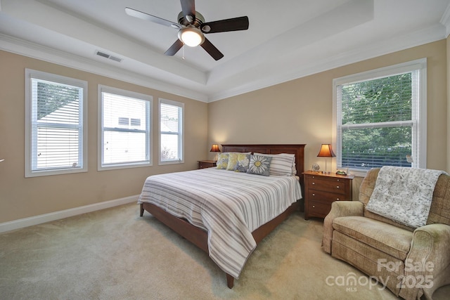 909 Autumn Glen Ct, Clover, SC 29710 - bedroom featuring a tray ceiling, multiple windows, ornamental molding, light colored carpet, and baseboards