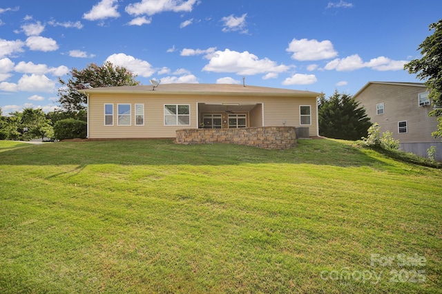 909 Autumn Glen Ct, Clover, SC 29710 - back of house featuring a lawn and ceiling fan
