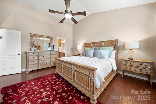 7130 Maricopa Rd, Charlotte, NC 28277 - bedroom featuring dark wood-style floors, ensuite bath, ceiling fan, baseboards, and high vaulted ceiling