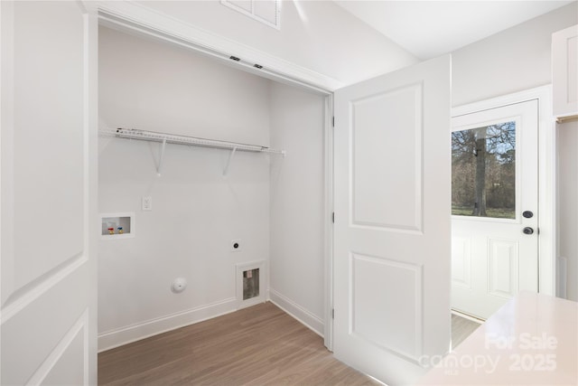 4911 Victoria Ave, Charlotte, NC 28269 - washroom featuring hookup for a gas dryer, hookup for an electric dryer, light wood-type flooring, hookup for a washing machine, and baseboards