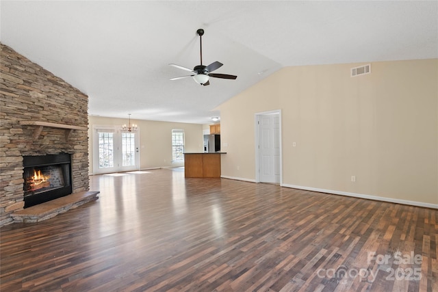 116 Dean Rd, Anderson, SC 29625 - unfurnished living room with dark wood finished floors, a ceiling fan, a chandelier, a stone fireplace, and baseboards