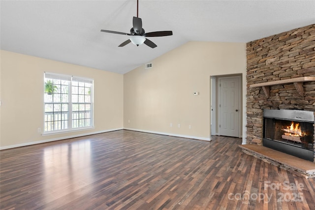 116 Dean Rd, Anderson, SC 29625 - unfurnished living room featuring vaulted ceiling, wood finished floors, ceiling fan, a fireplace, and baseboards