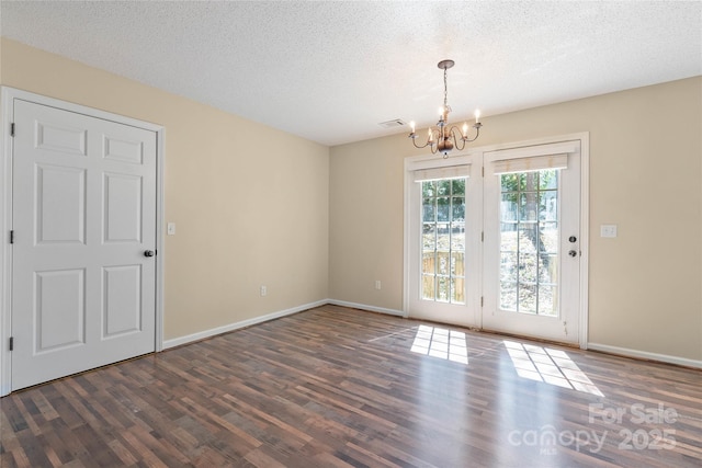 116 Dean Rd, Anderson, SC 29625 - unfurnished dining area featuring a chandelier, wood finished floors, baseboards, and a textured ceiling