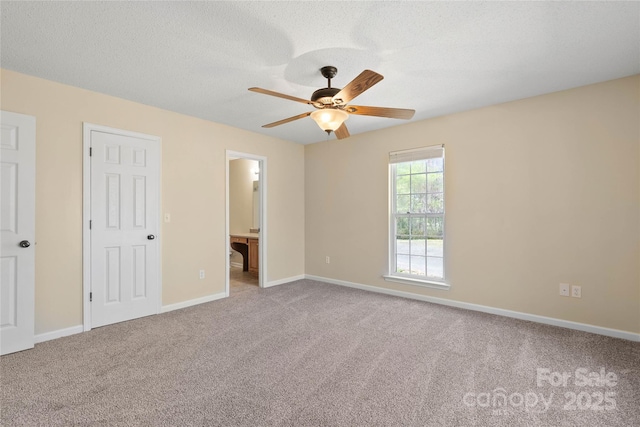 116 Dean Rd, Anderson, SC 29625 - unfurnished bedroom with carpet floors, baseboards, ensuite bath, and a ceiling fan