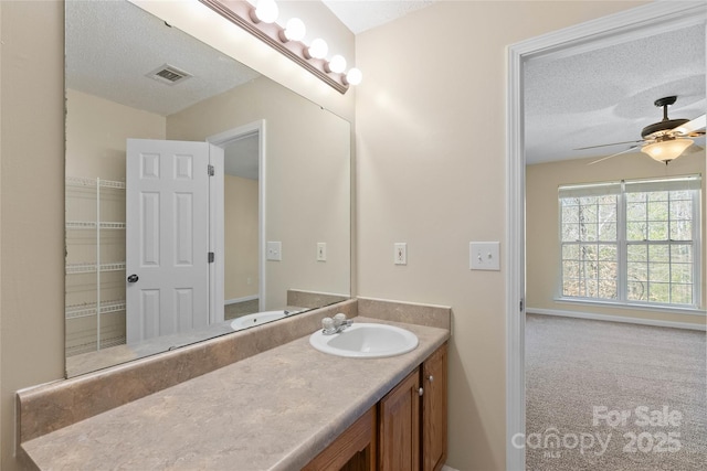 116 Dean Rd, Anderson, SC 29625 - bathroom with vanity, a textured ceiling, and ceiling fan