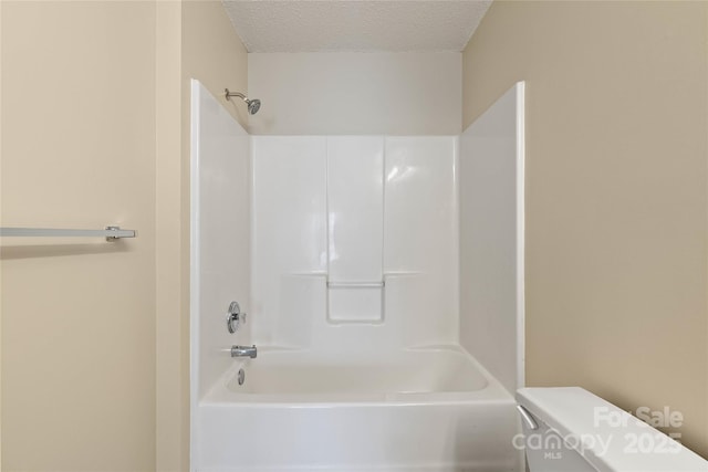 116 Dean Rd, Anderson, SC 29625 - bathroom featuring toilet, a textured ceiling, and tub / shower combination
