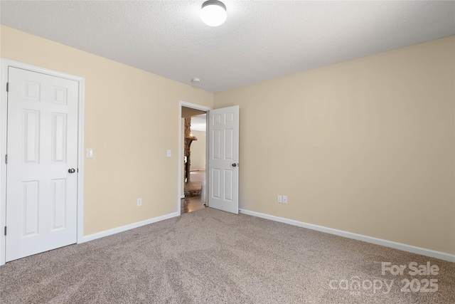 116 Dean Rd, Anderson, SC 29625 - unfurnished bedroom with carpet floors, baseboards, and a textured ceiling