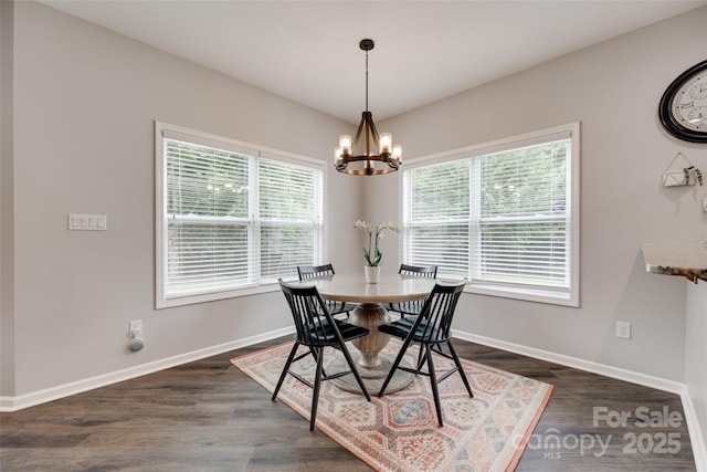424 Castlebury Ct, Clover, SC 29710 - dining space featuring a chandelier, baseboards, and dark wood-type flooring