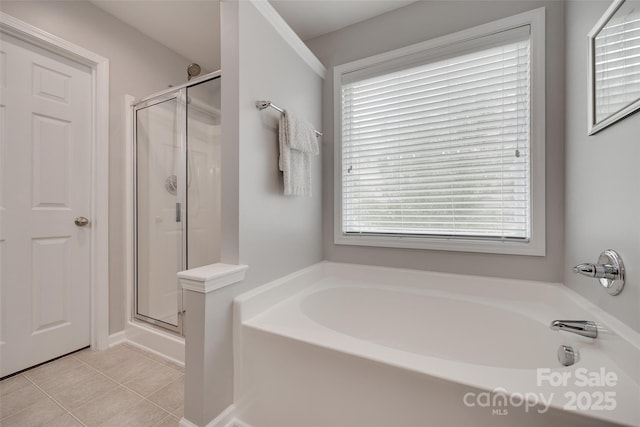 424 Castlebury Ct, Clover, SC 29710 - bathroom with a bath, a shower stall, and tile patterned flooring