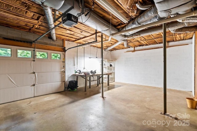 460 27th Avenue Cir NW, Hickory, NC 28601 - garage with a garage door opener and concrete block wall