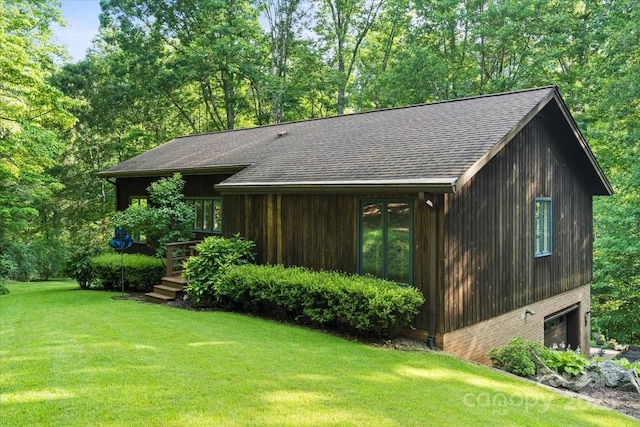 460 27th Avenue Cir NW, Hickory, NC 28601 - view of side of property with a yard, roof with shingles, and a garage