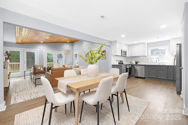 4838 Keats Ave, Charlotte, NC 28212 - dining area with recessed lighting and light wood finished floors