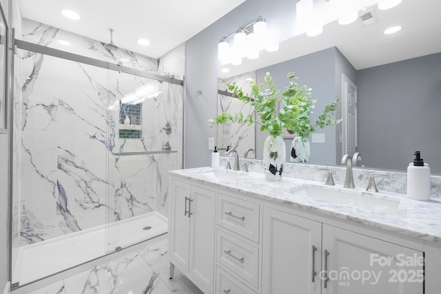 4838 Keats Ave, Charlotte, NC 28212 - full bath featuring double vanity, a marble finish shower, marble look tile flooring, and recessed lighting