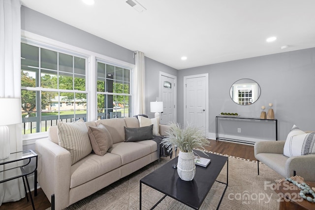 4838 Keats Ave, Charlotte, NC 28212 - living area featuring wood finished floors and recessed lighting