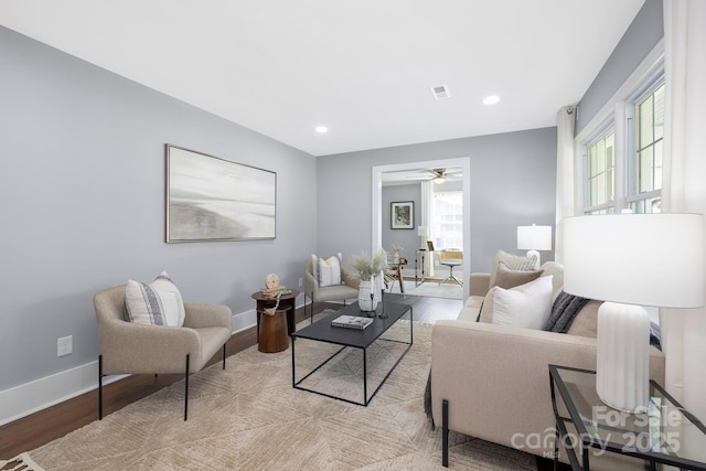4838 Keats Ave, Charlotte, NC 28212 - living area featuring wood finished floors, ceiling fan, and recessed lighting