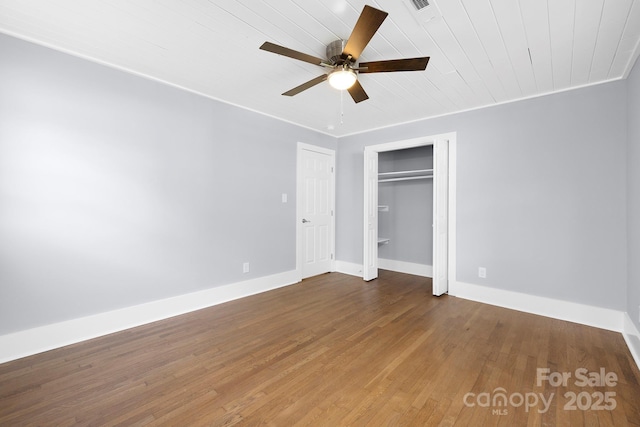 4838 Keats Ave, Charlotte, NC 28212 - unfurnished bedroom with wood finished floors, a ceiling fan, a closet, and wooden ceiling