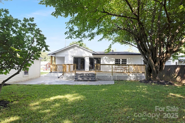 4838 Keats Ave, Charlotte, NC 28212 - back of property featuring french doors, a deck, and a patio