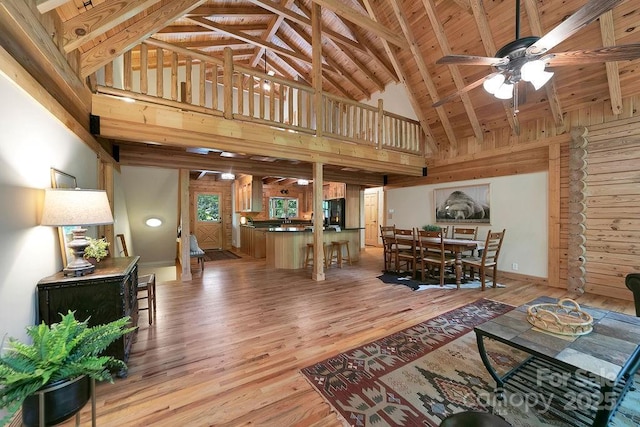 76 Isuhdavga Ct, Brevard, NC 28712 - living room with high vaulted ceiling, light wood-type flooring, ceiling fan, and wood ceiling with exposed beams