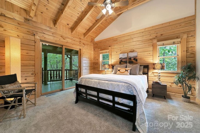 76 Isuhdavga Ct, Brevard, NC 28712 - bedroom with access to exterior, carpet, wood ceiling with exposed beams, wooden walls, and high vaulted ceiling
