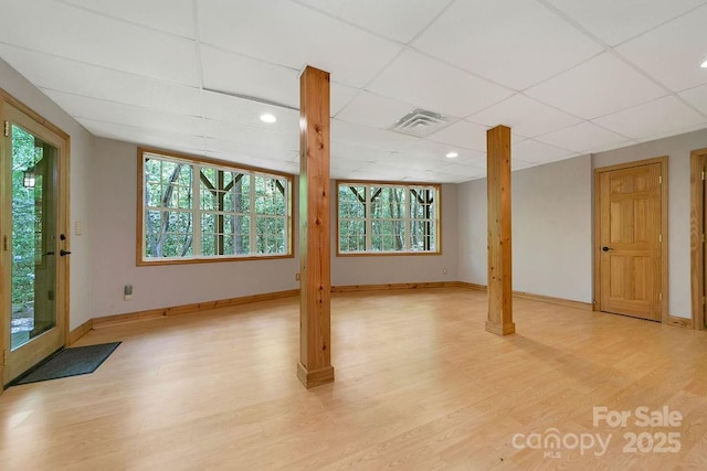 76 Isuhdavga Ct, Brevard, NC 28712 - basement featuring healthy amount of natural light, light wood finished floors, baseboards, a drop ceiling, and recessed lighting