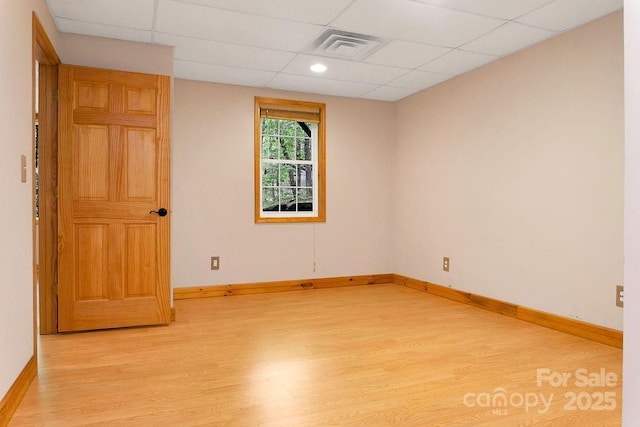 76 Isuhdavga Ct, Brevard, NC 28712 - unfurnished room featuring light wood-style flooring, a paneled ceiling, and baseboards