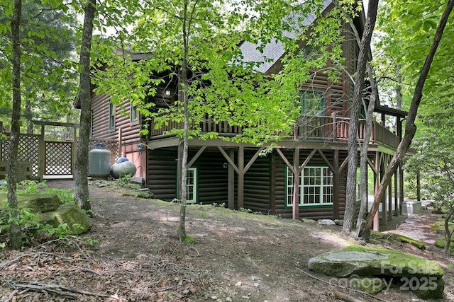 76 Isuhdavga Ct, Brevard, NC 28712 - back of property featuring faux log siding and a deck