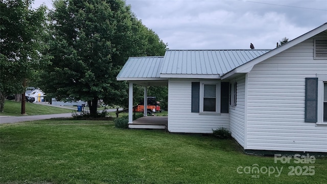 85 Oshea Ln, Waynesville, NC 28786 - view of side of home with a yard and metal roof