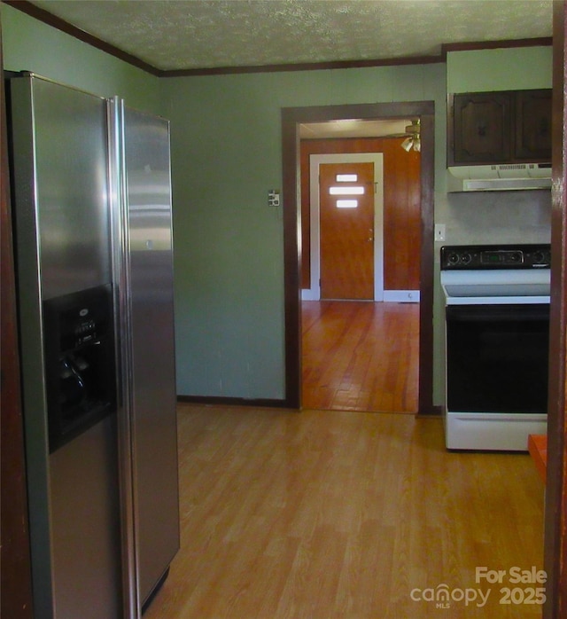 85 Oshea Ln, Waynesville, NC 28786 - kitchen featuring stainless steel refrigerator with ice dispenser, white stove, under cabinet range hood, crown molding, and light wood-style flooring