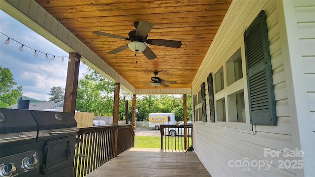 85 Oshea Ln, Waynesville, NC 28786 - wooden deck with ceiling fan and area for grilling