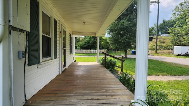 85 Oshea Ln, Waynesville, NC 28786 - wooden porch featuring a yard