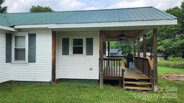 85 Oshea Ln, Waynesville, NC 28786 - deck featuring a ceiling fan and a yard
