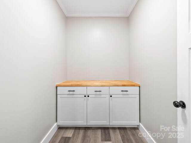 123 Edwards Ave, Swannanoa, NC 28778 - detailed view of wood finished floors, ornamental molding, and baseboards