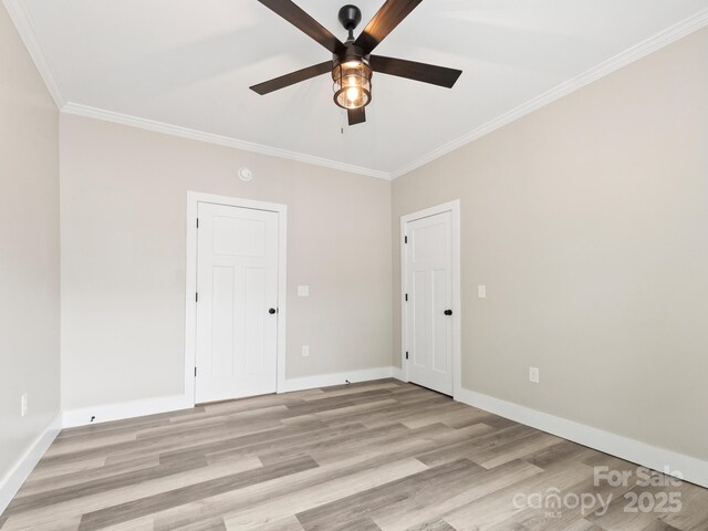 123 Edwards Ave, Swannanoa, NC 28778 - unfurnished room featuring ceiling fan, crown molding, light wood finished floors, and baseboards